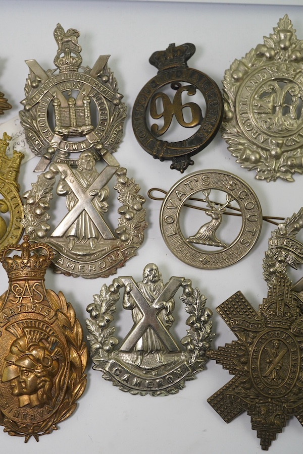 Fourteen Glengarry badges, cap badges, etc. including; 96th Regiment of Foot, Royal Scots Fusiliers, Coldstream Guards pouch badge, 21st SAS Artists Rifles, Cameron Highlanders, 56th West Essex Regiment, Argyle and Suthe